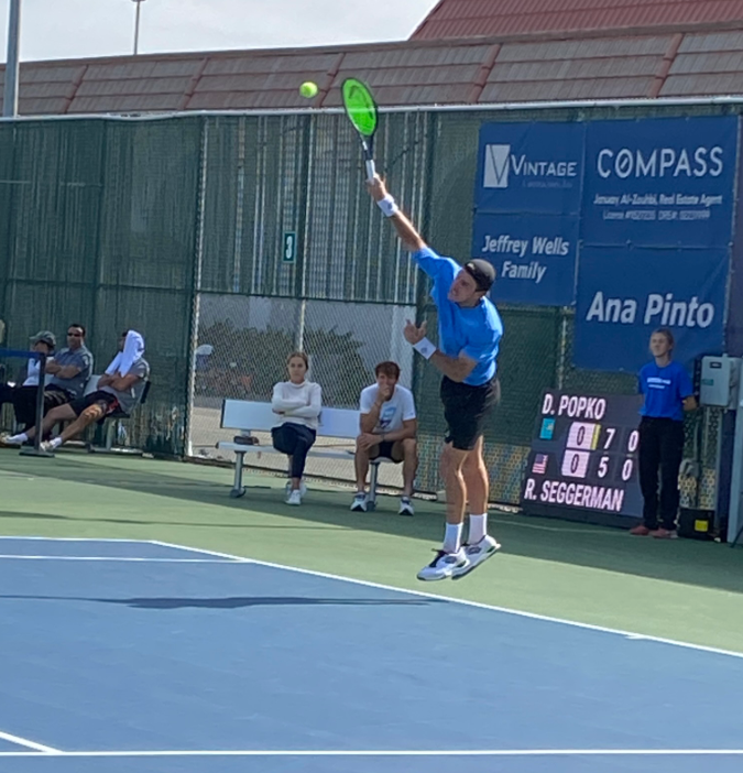 Dmitry Popko giving his full physical and emotional strength to serve the ball