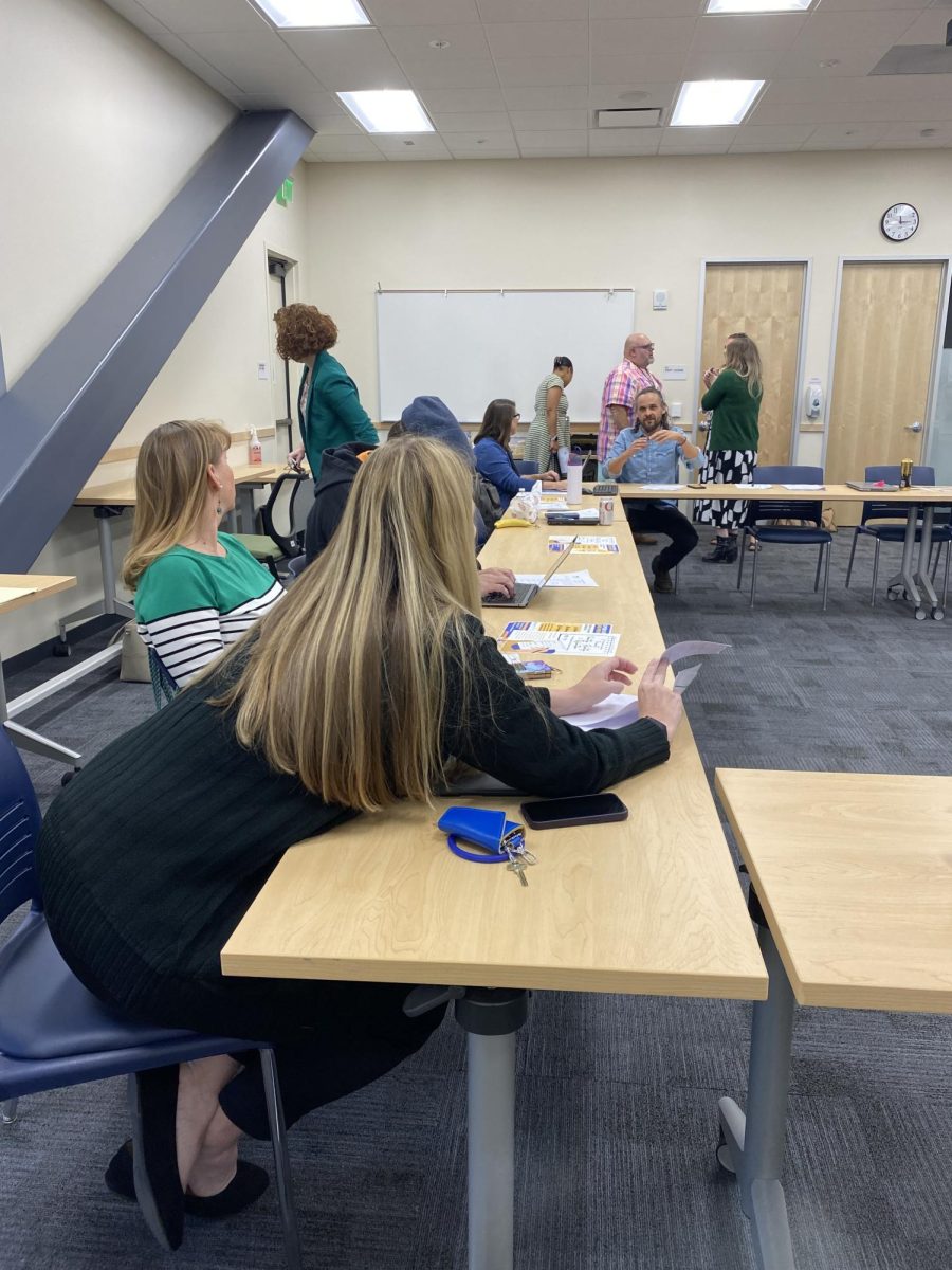 Busy Business: Solano Faculty gather in the conference room of the library in their once a month meeting.