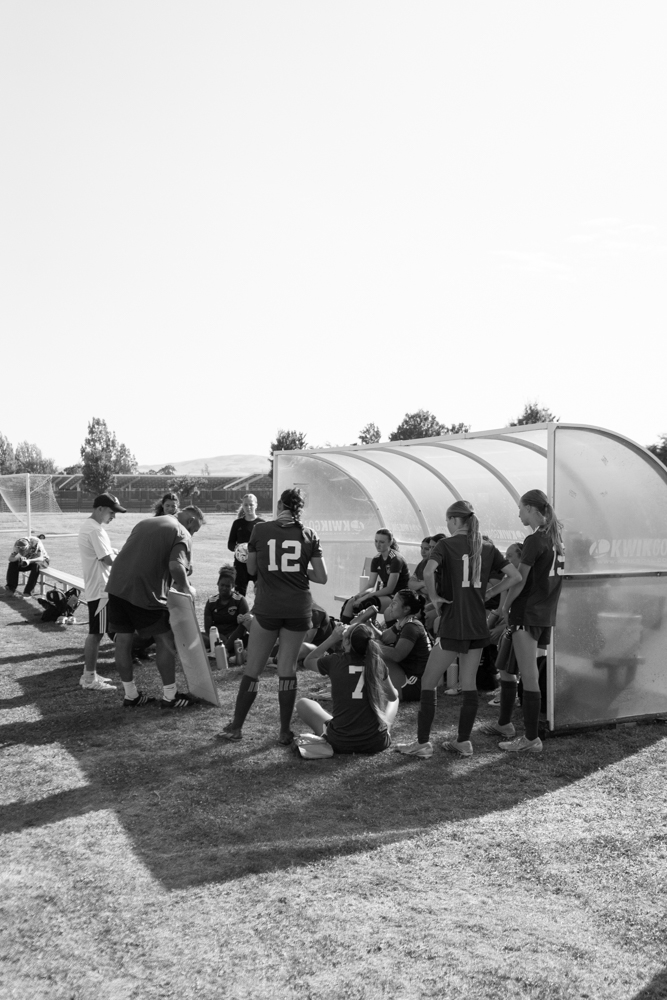Team huddle at HT lead by Coach Alonso and Assistant Coach Peter