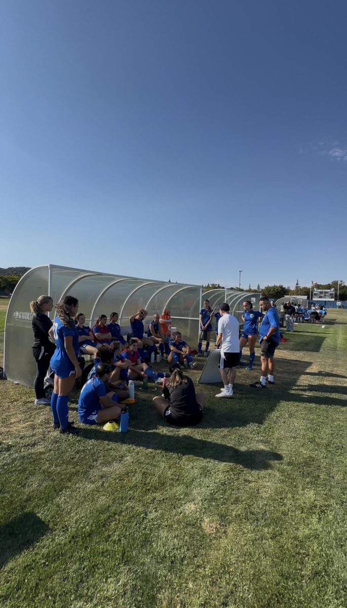 Team huddle at HT lead by Coach Alonso