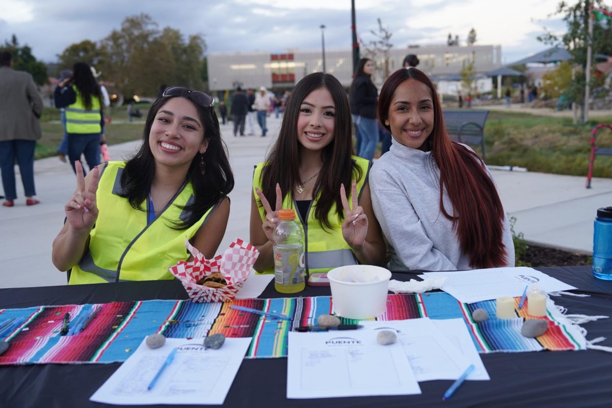 Solano Student and Puente President Veronica and Solano Students check in Guests to Banda Night on October 10, 2025