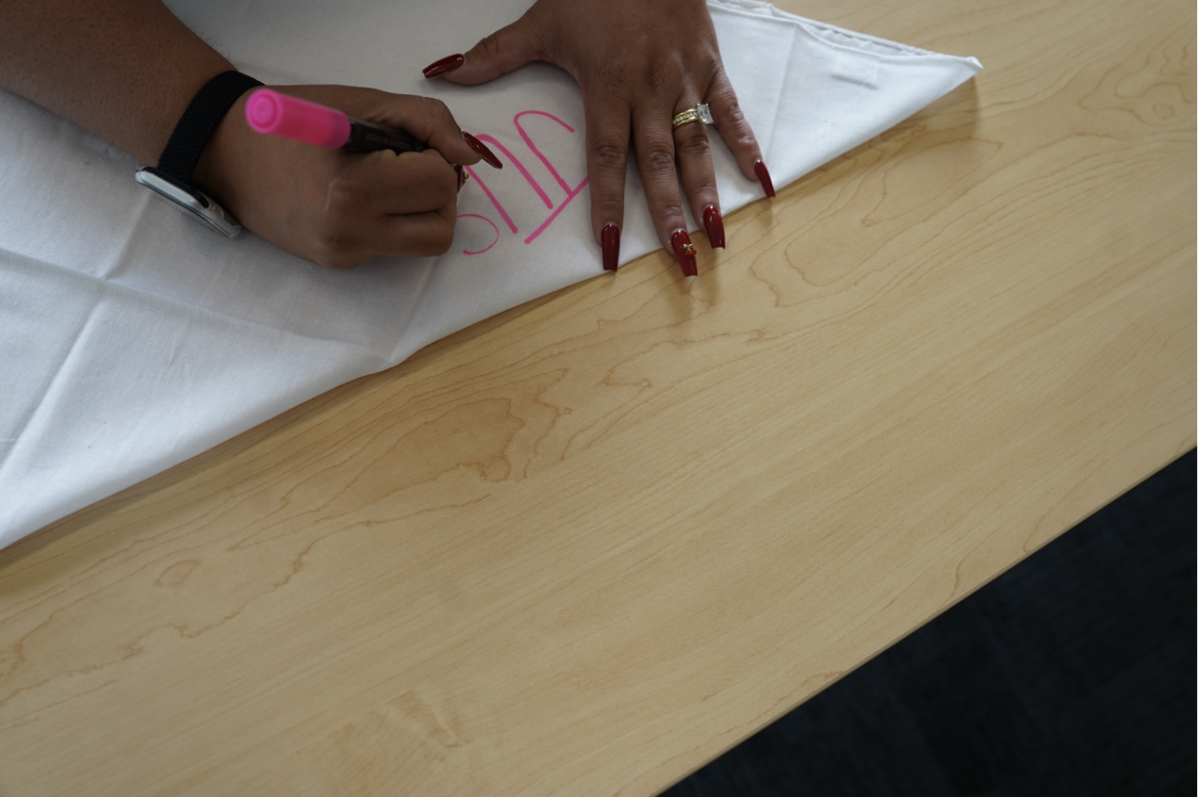 Dr. Gabriela Ballesteros decorating her bandana, October 1, 2025