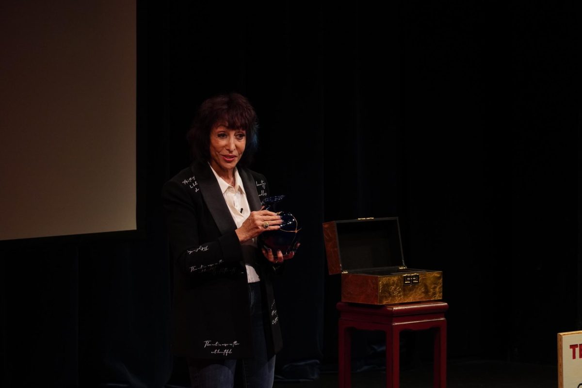 Kintsugi is the Japanese art of repairing broken pottery using a metallic lacquer. Dr. Nicki Joy Monti holds a piece of pottery repaired using kintsugi, during her talk titled "The Kintsugi Fix: How Heartbreak Saved My Life," Friday, March 13, 2026.